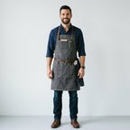 Heavy-Duty Dark Grey Canvas Work Apron with Brown Leather Straps & Pockets