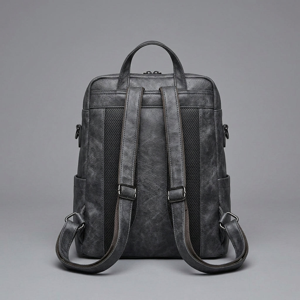 Black Leather Backpack with Triangular Metal Accent