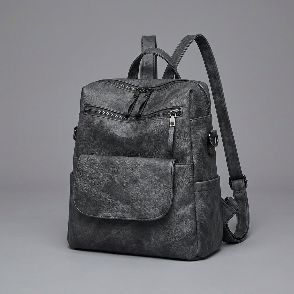 Black Leather Backpack with Triangular Metal Accent